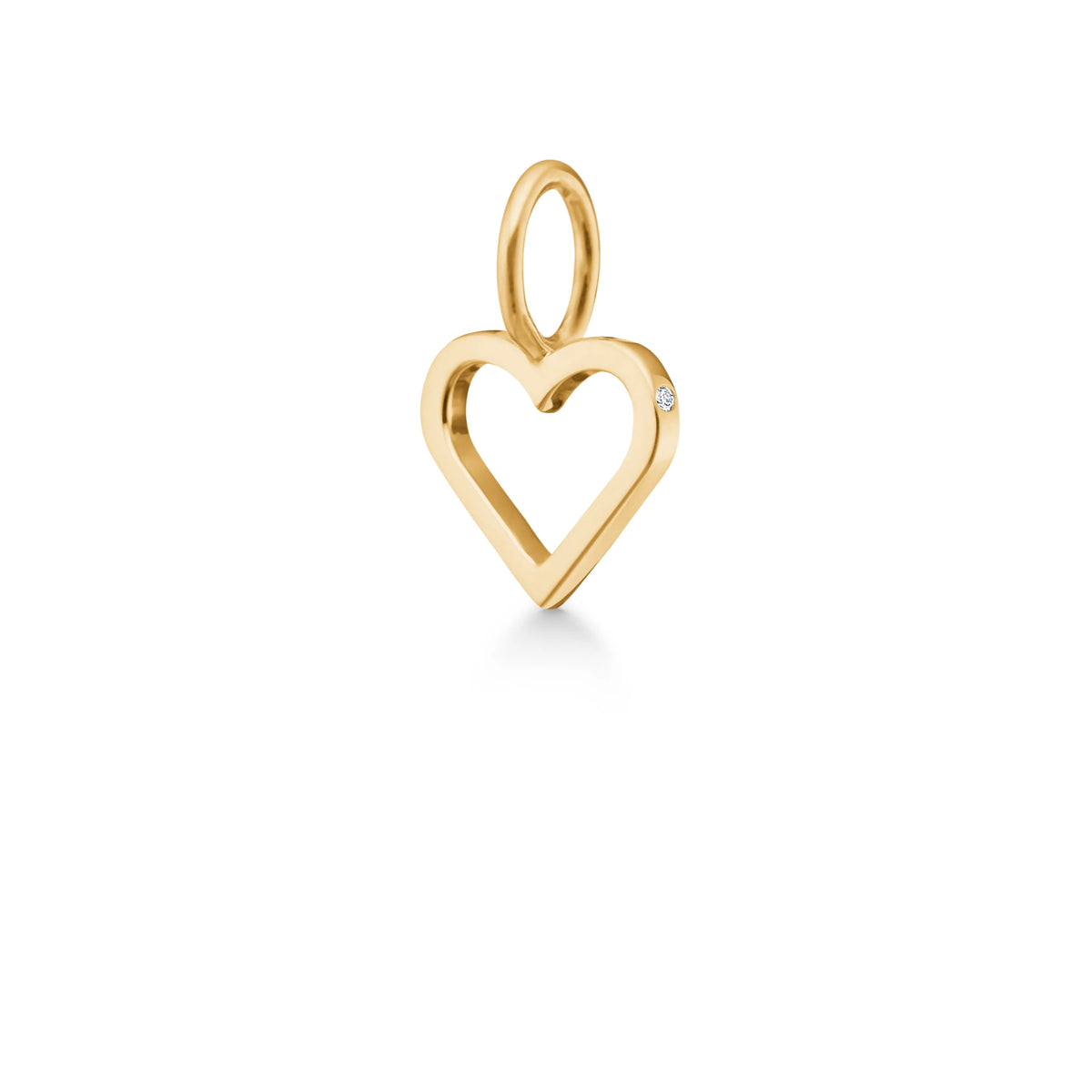 ro copenhagen symbols open heart pendant 18 kt gold shows a heart pendant in bright gold with small diamond detail. Model p111y107-1