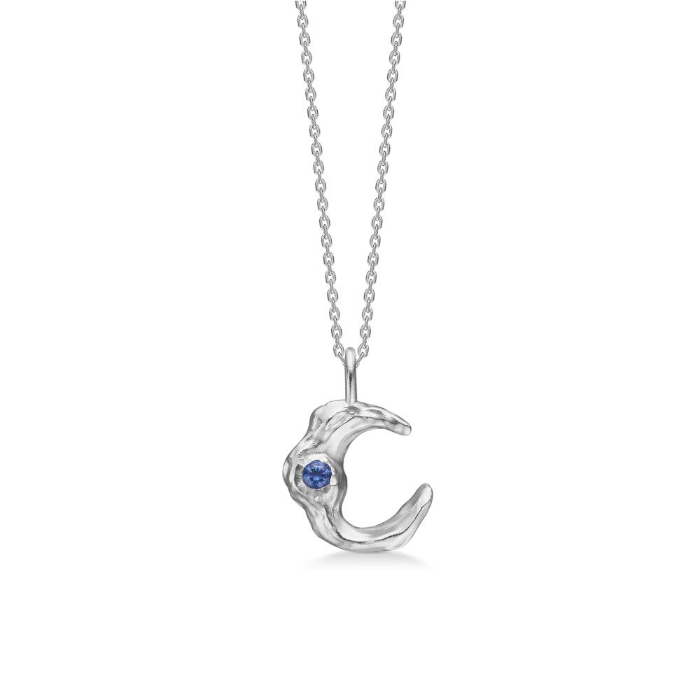 Studio Z Lunar pendant necklace features a silver crescent moon with blue stones. Model 7127881-1