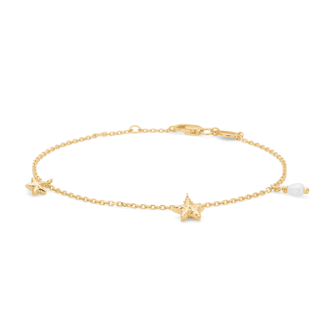 Studio Z Starfish Luster gold-plated starfish bracelet with two starfish and a white pearl on a thin chain. Model 7253903-1