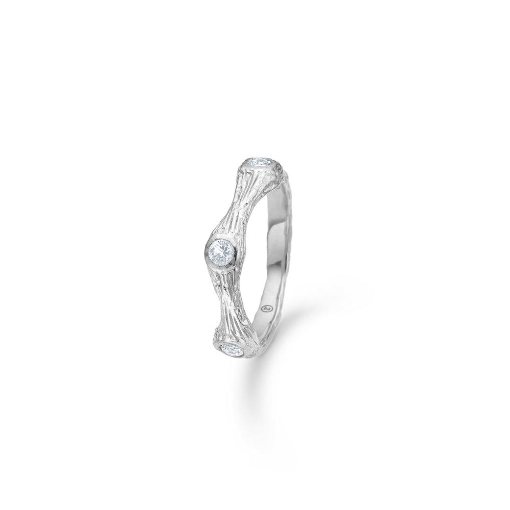 Studio Z Tangled Ring with textured silver and set stones on a white background. Model 7147814-001.
