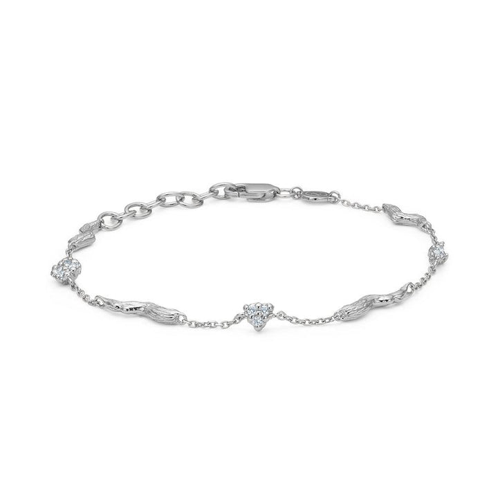 Studio Z Tangled Silver Bracelet with Zirconia shows an elegant silver bracelet with clear stones, Model 7157845-1.