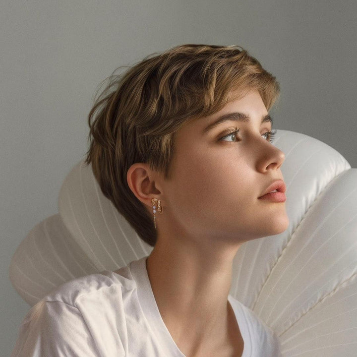 studio-z-urchin-elegance-gold-plated-pearl-earrings shown on model, golden colors and elegant design, Model 7217920-2