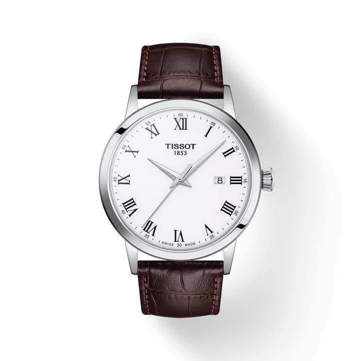Tissot Classic Dream 42mm with white dial, Roman numerals and brown leather strap. Model T1294101601300.