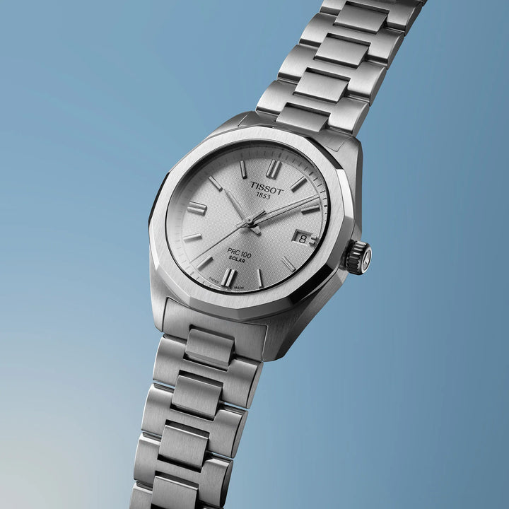 Tissot PRC 100 Solar 34mm steel watch with silver dial and date on the chain in polished steel. Model T1518221103100