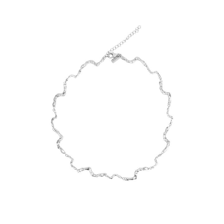 Vincent Nightfall Silver Necklace shown on white background with wavy, shiny silver structure. Model VJ127