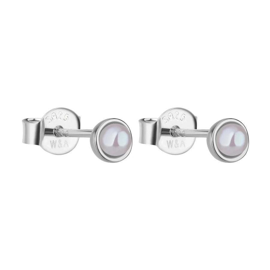 Wioga Adora earrings in silver with round pearl, simple and elegant. Model E-8402-S-1.