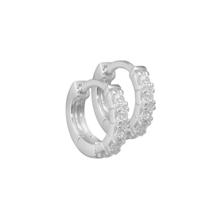 Aqua Dulce Darling silver earrings with shiny clear stones, round model. Model 2098-2098-1