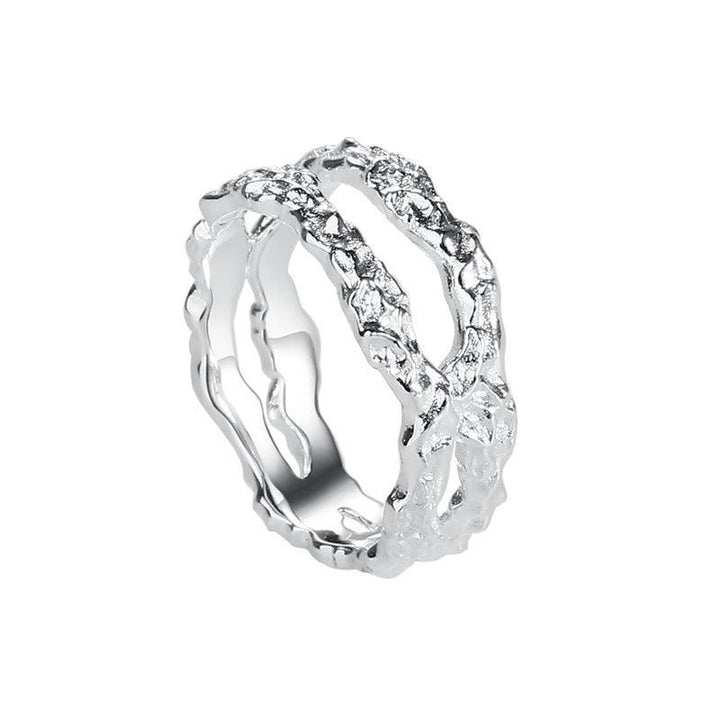 Aqua Dulce Mila Ring Silver shows an elegant, textured silver ring with a rough surface. Model 4674-4674-001-1.