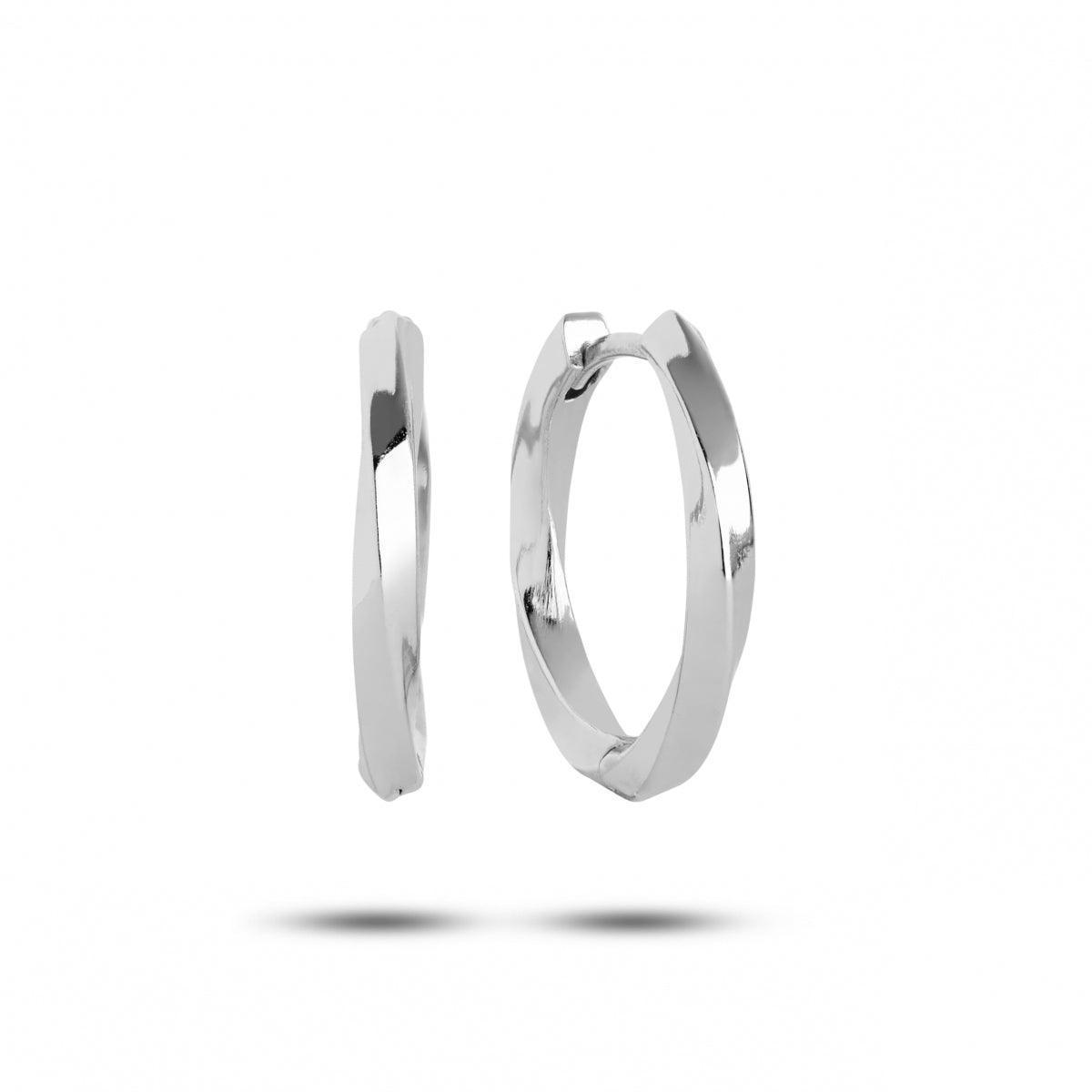 carre hoop in silver 20mm shows a pair of simple, polished silver hoops with a faceted design. Model SH4275-SH4275-2CM