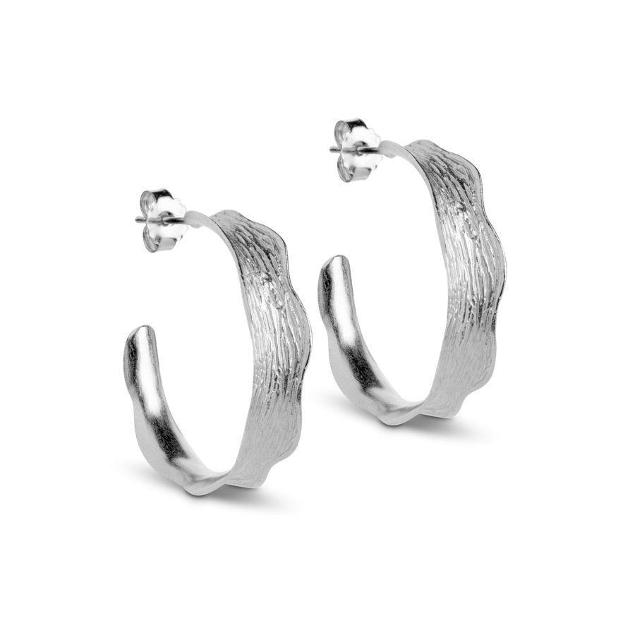 enamel-ane-large-hoops e288sm, silver hoops with wavy textured surface, Model e288sm-1