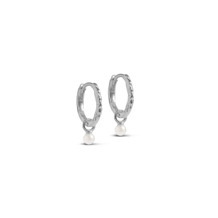 Enamel Belle Hoops Pearl shows a pair of small silver hoops with a hammered look and a small white pearl. Model e271sm-pearl.