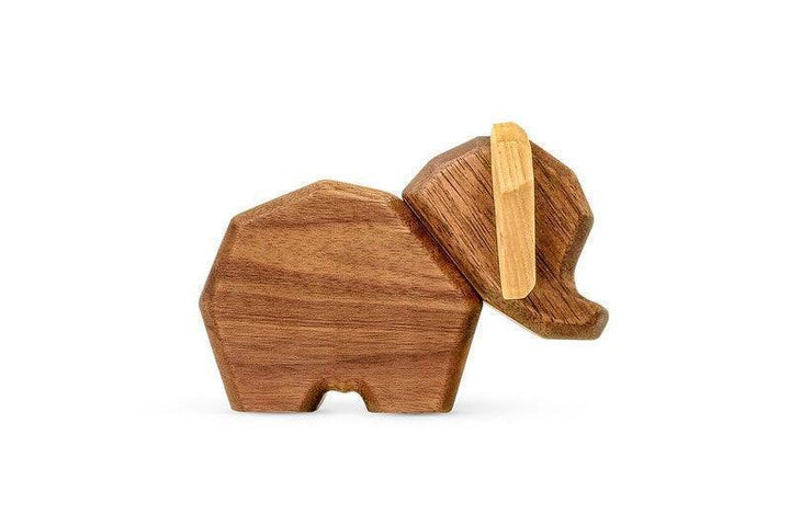 Fablewood Little Elephant shows a small elephant figure in light and dark wood with a rotating head. Model 9006-1