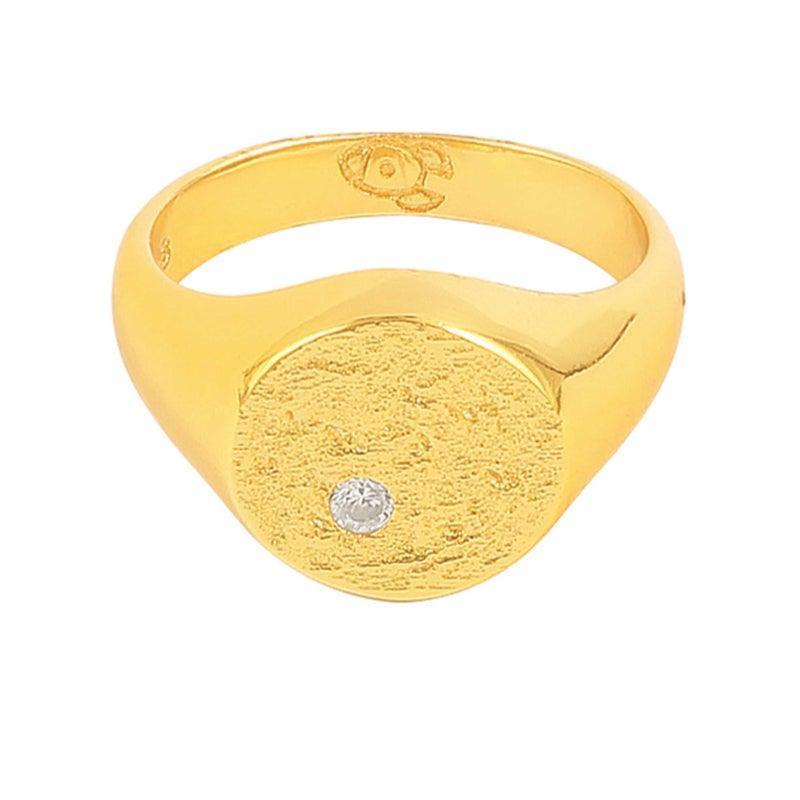 Hultquist Copenhagen Luna Ring S08116G shows a gold-tone ring with a round, matte surface and one clear stone. Model S08116G-002-1