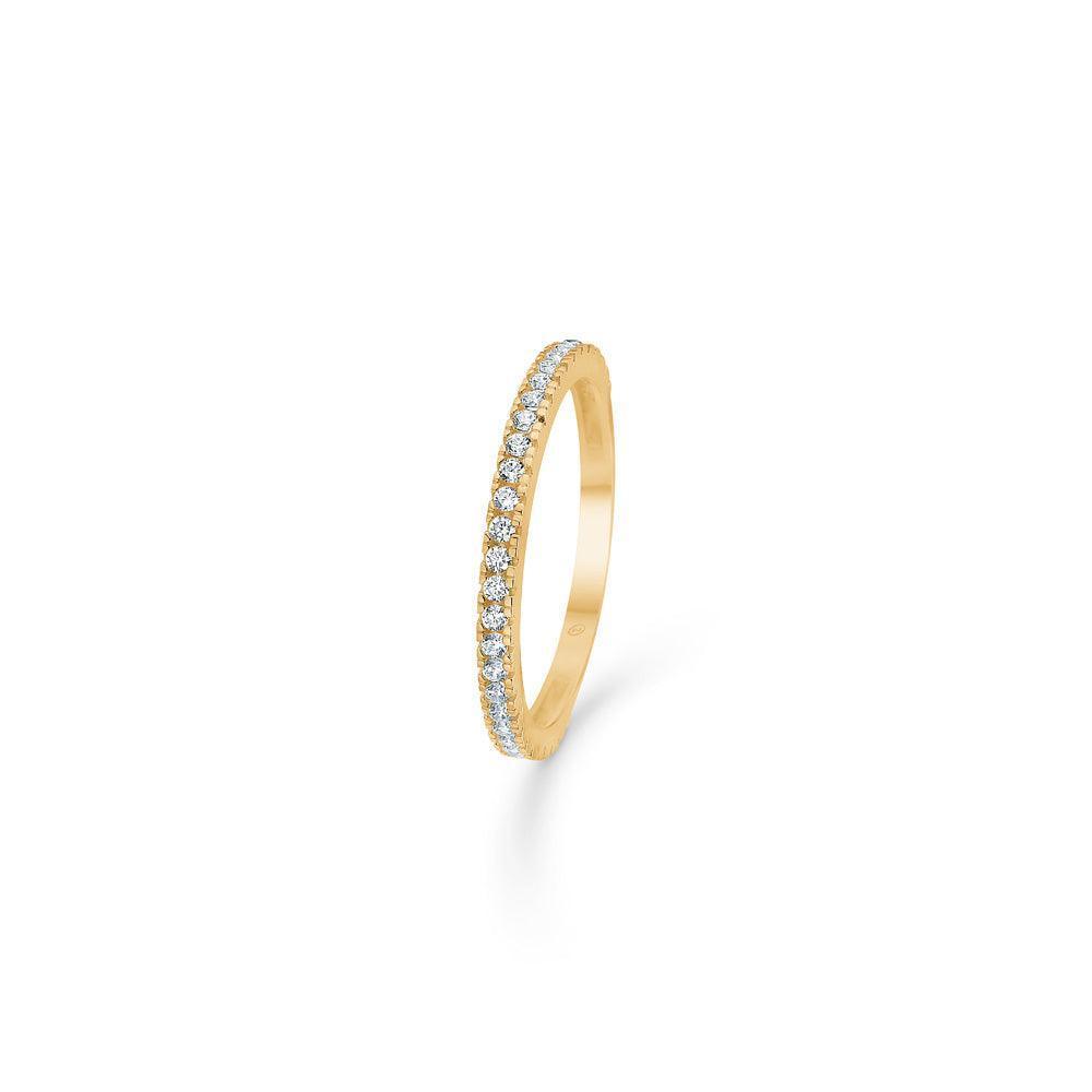 Mads Z 8kt Sparkle Ring shown as a slim gold ring with clear stones in a row. Model 3347165-001.