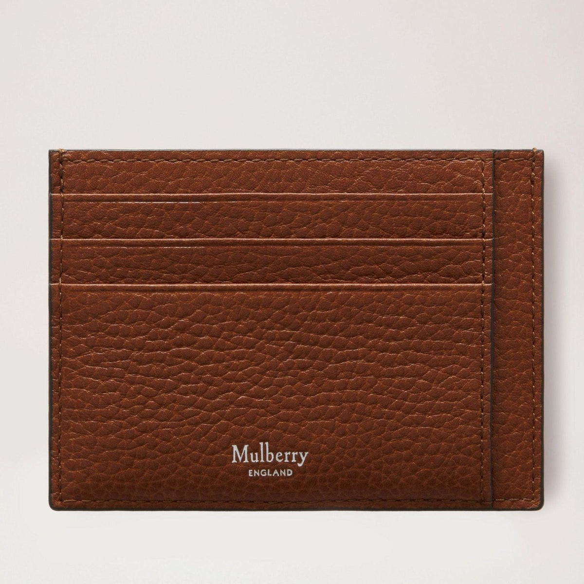 Mulberry Card Holder Two Tone Oak shows a brown leather card holder with an embossed texture. Model RL7423552G110