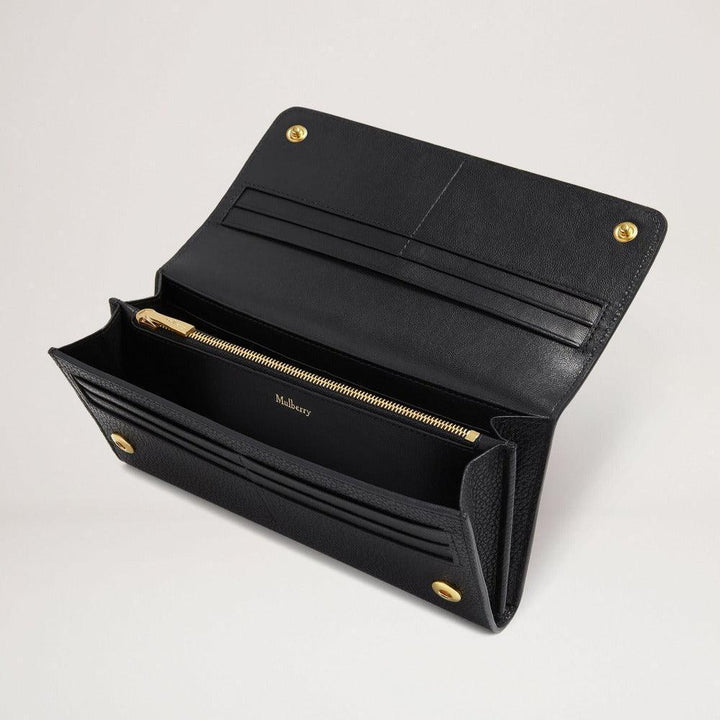 Mulberry Continental Wallet Black shown open with many pockets, card slots and golden details, Model rl4440205a100.