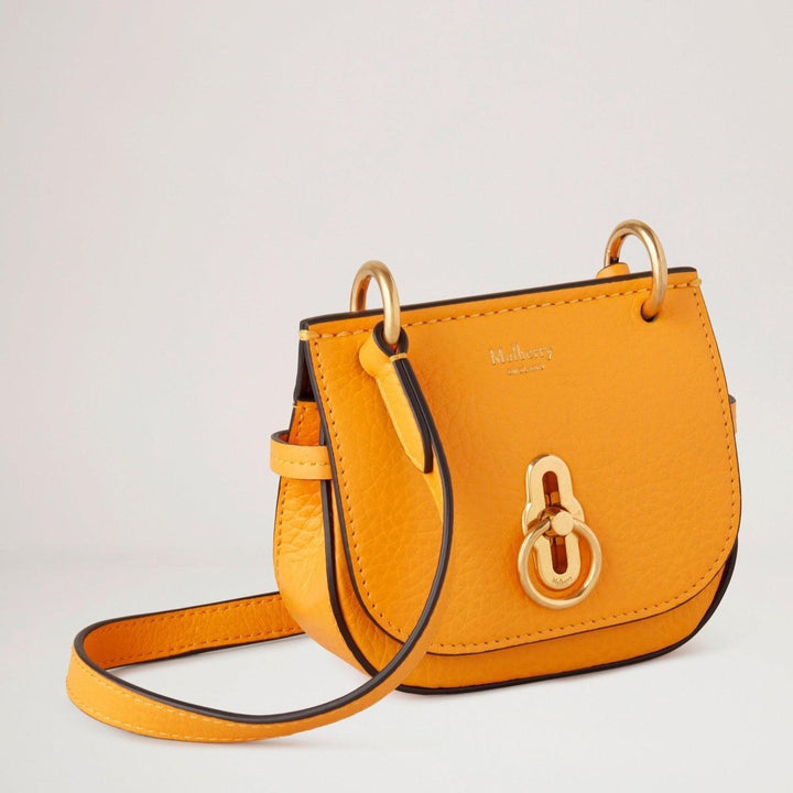 Mulberry Micro Amberley Double Yellow, small yellow leather bag with gold-colored buckle. Model RL7409736P677.