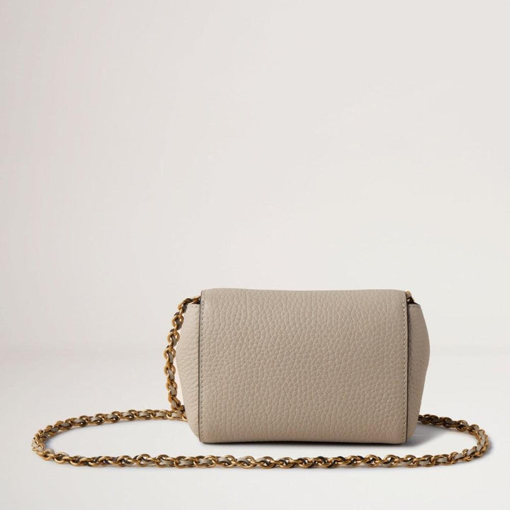 Mulberry Mini Lily Chalk bag in light gray leather with gold chain seen from the back. Model rl7749736w160.