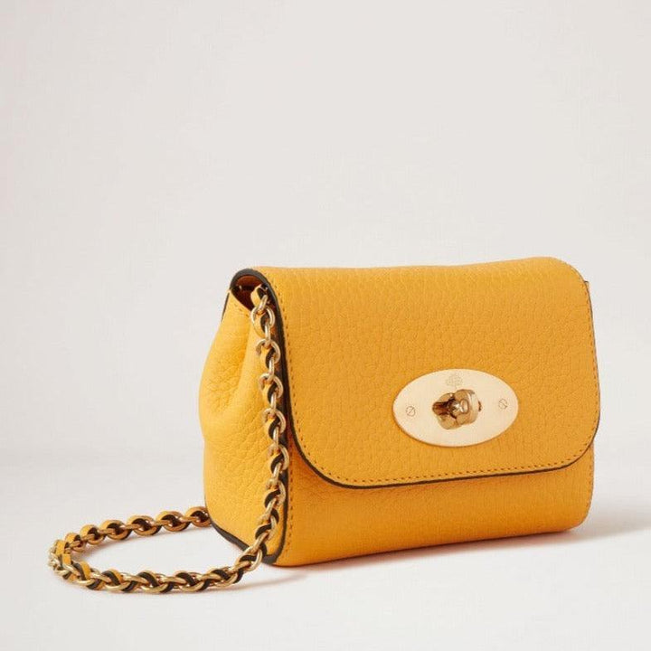 Mulberry Mini Lily Double Yellow clutch in yellow leather with chain strap and gold metal clasp. Model RL7749736P677