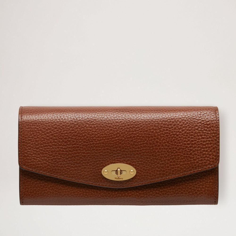 Mulberry Purse Darley Wallet in brown embossed leather with golden buckle, seen from the front. Model RL7415552G110