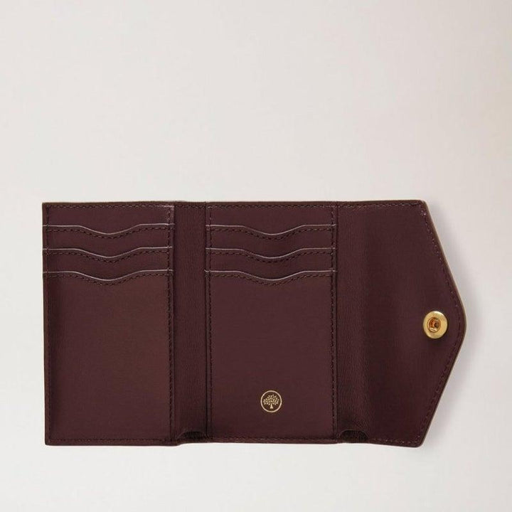Mulberry Wallet Folded Multi Card Wallet Balck shows folded wallet in dark brown leather with card holders and gold details. Model RL6447205A100.