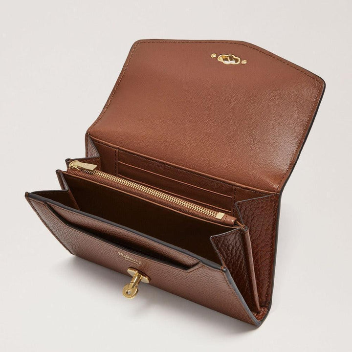 Mulberry Purse Medium Darley Wallet Oak shows the interior of the wallet with compartments, zipper and brass details. Model RL7416552G110.