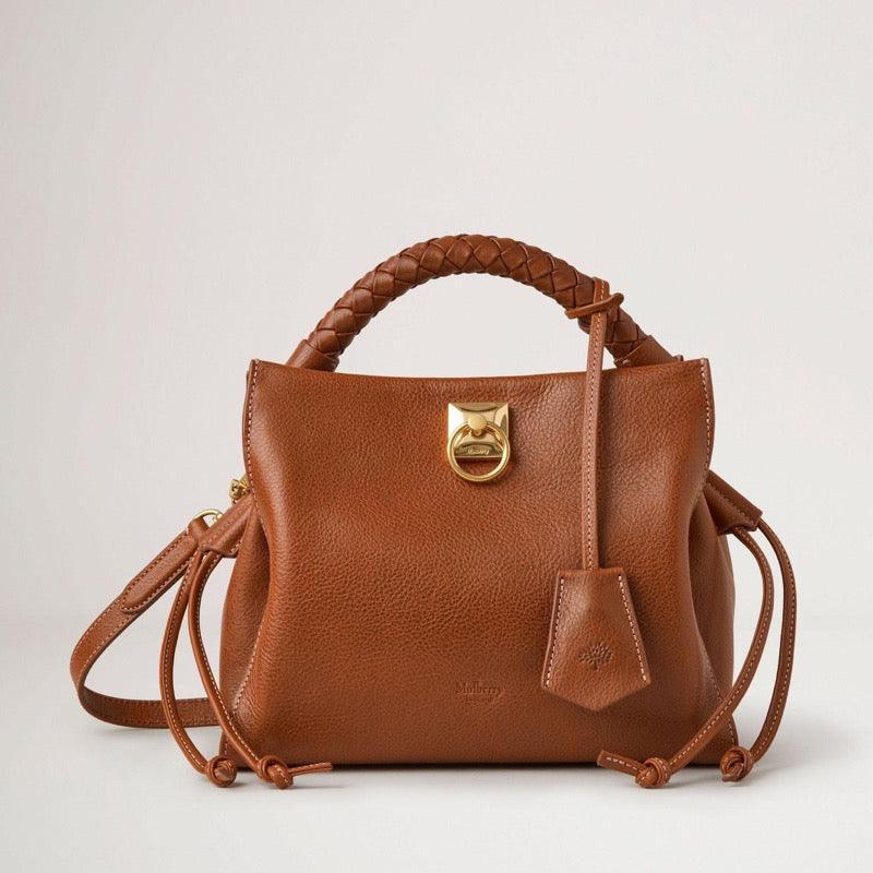 Mulberry Bag Small Iris Legacy NVT Oak, brown leather bag with braided handle and gold details. Model HH7949275G110