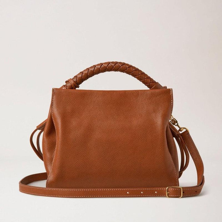 Mulberry Bag Small Iris Legacy NVT Oak shows a brown leather bag with braid detail and adjustable strap. Model HH7949275G110