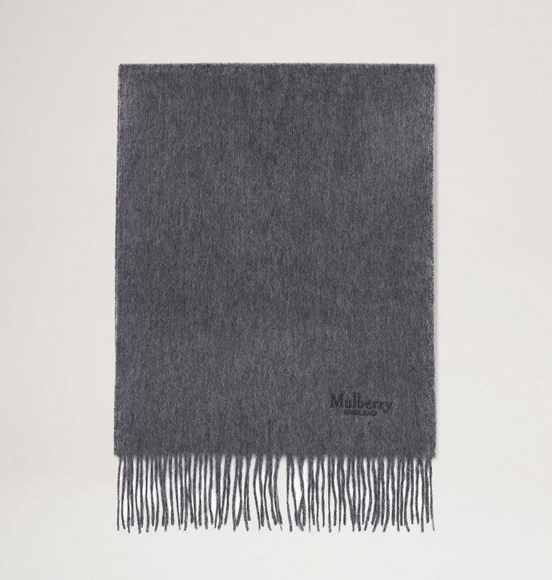 Mulberry Shawl Cashmere Scarf gray in charcoal gray cashmere with fringes, seen against a light background. Model vs4460484c601.