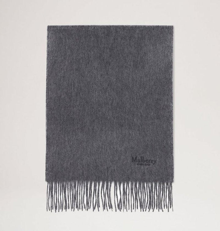 Mulberry Shawl Cashmere Scarf gray in charcoal gray cashmere with fringes, seen against a light background. Model vs4460484c601.