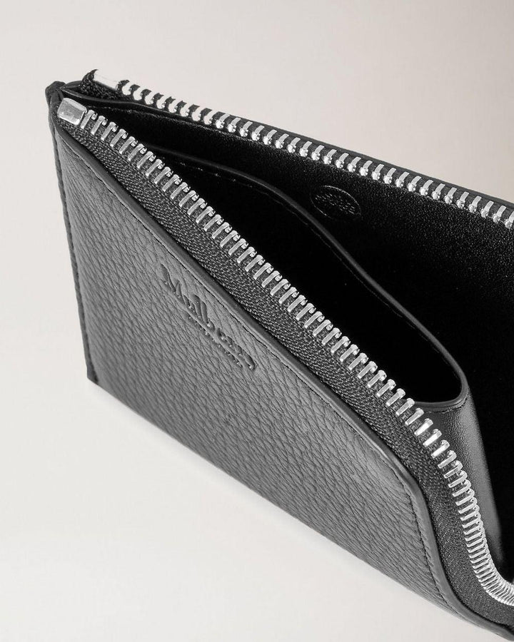 Mulberry Zipped Wallet Heavy Grain Black shows an elegant black wallet in heavy, embossed leather, Model RL6360/736A100