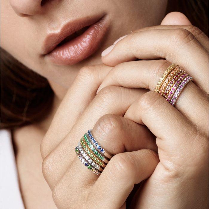 Nuran 14kt Pera Gemstone Ring shown worn on fingers, multiple colorful rings in gold. Model a2500-mul-001-2