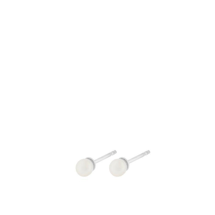 Pernille Corydon Lagoon Stud Earrings features a pair of small silver stud earrings with a pearl-like front. Model E-113-S.