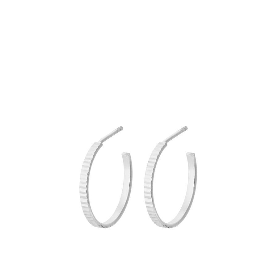 Pernille Corydon Sea Reflection Hoops shows elegant silver earrings with fluted surface, Model E-484-S