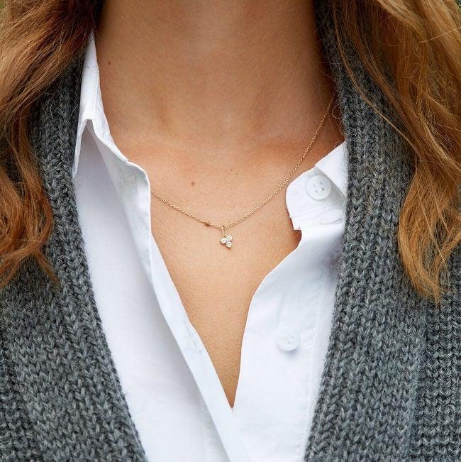 ro copenhagen 18kt frid diamond 0.18ct pendant shown on neck in gold with diamond, elegant and discreet Model111614-2