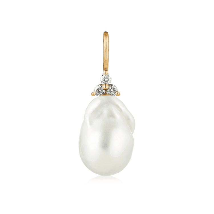 ro copenhagen 18kt joy pearl with diamonds shows an irregular white pearl with diamonds and gold pendant. Model 106587-1