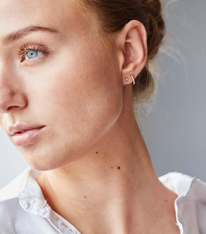 ro copenhagen 18kt orbit dot orestik white gold shown on ear in profile, elegant detail, Model 119164-2