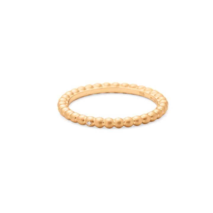 RO Copenhagen 18kt Orbit Dot Ring shown in brushed gold with small balls and a single diamond. Model90878-001-1
