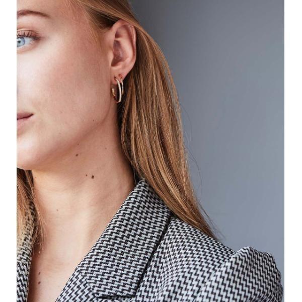 RO Copenhagen 18kt Rock Classic Diamond Creole shown on woman with light hair, elegant and timeless look. Model 119258-2