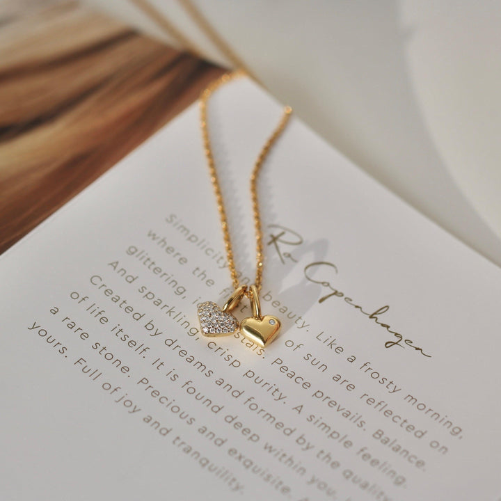 Ro Copenhagen 18kt Rock My Heart diamond heart pendant in gold with pavé and shiny heart, model 121371-2