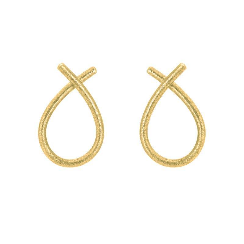 Susanne Friis Bjørner Gilded Drop Earrings shows a pair of simple drop-shaped studs in a matte gold-plated finish. Model 53602-5360-2-1